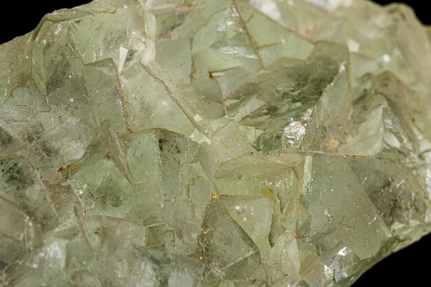 Macro stone mineral Fluorite on a black background