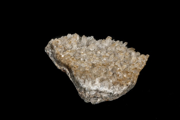 Macro stone mineral quartz with calcite on black background