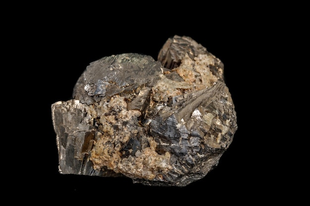 Macro stone Pyrite mineral with fluorite on a black background