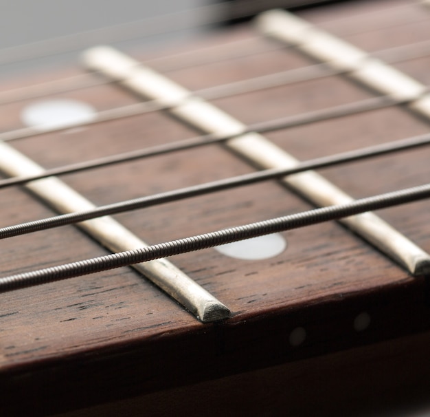 Macro of strings on electric guitar