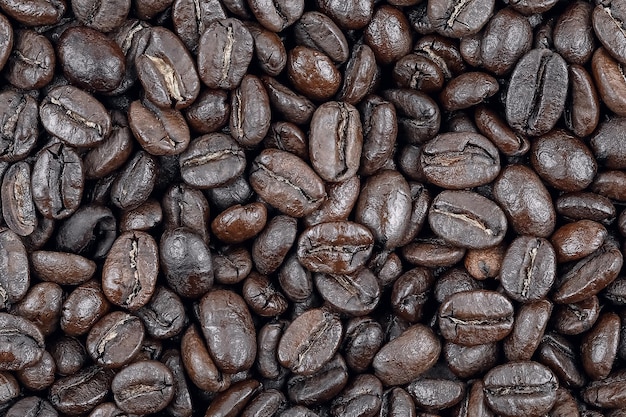 Macro texture of large roasted coffee beans