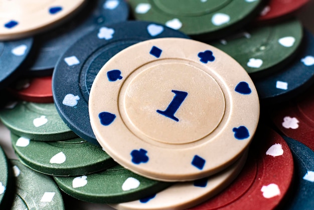 A macro view of different color poker playing chip