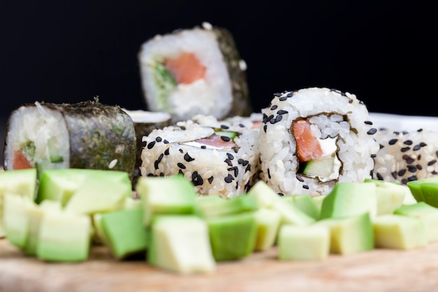 Made from trout rice and sushi vegetables, Asian rice and seafood food on the table during meals