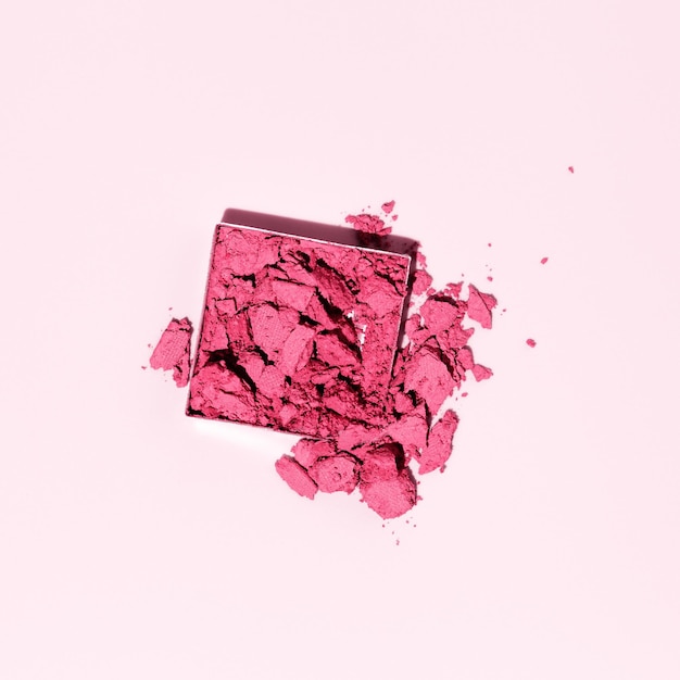 Magenta color eye shadow makeup swath crushed powder swatch Woman cosmetic and beauty product