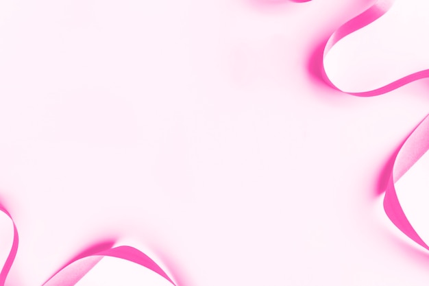 Magenta pink ribbons patterned background