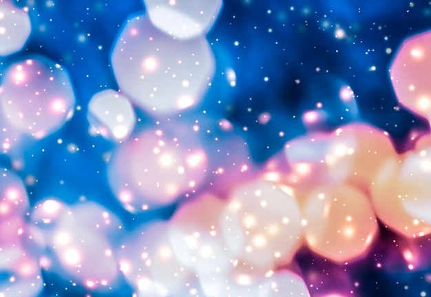 Magic sparkling shiny glitter and glowing snow luxury winter holiday background