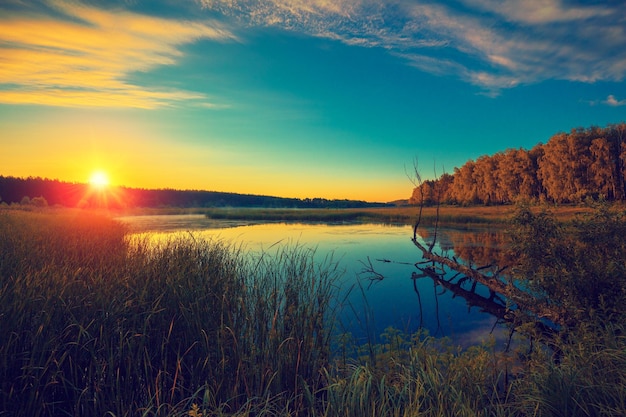 Magical sunrise over the lake Misty morning rural landscape wilderness mystical feeling