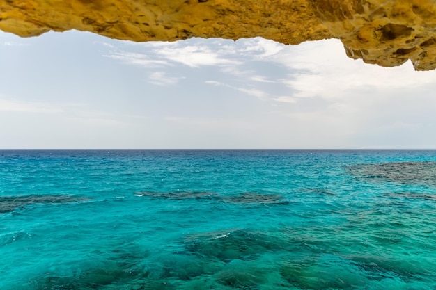 Magnificent view of the horizon from a cave on the shores of the Mediterranean Sea