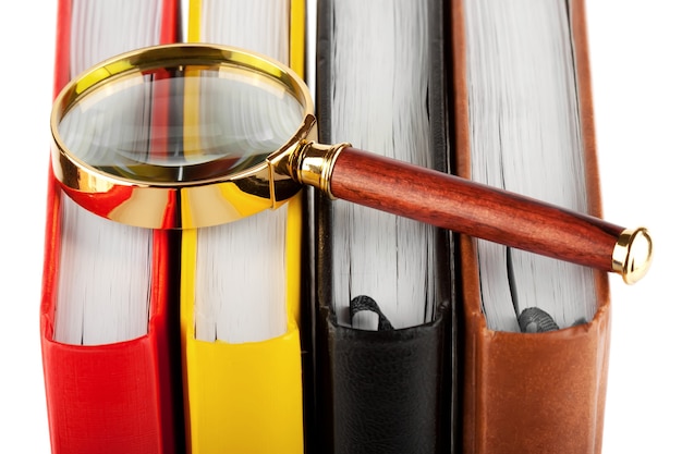 Magnifier and book closeup on the white