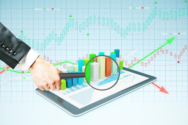 Magnifier over tablet with chart