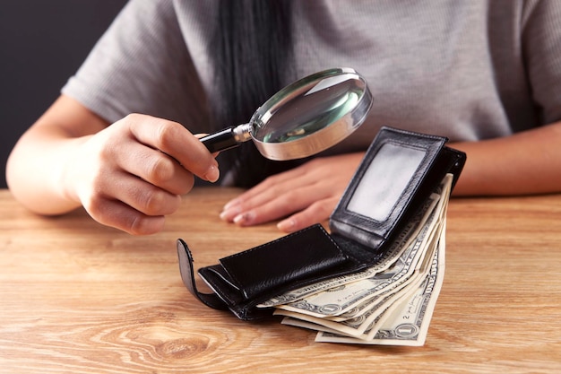 magnifying glass on the leather wallet