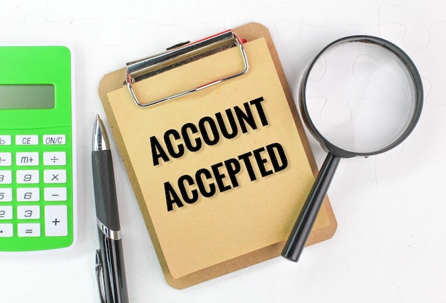 magnifying glass and paper with the word account accepted