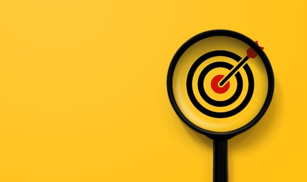 Magnifying glass with aiming dart board icon with copy space on yellow background