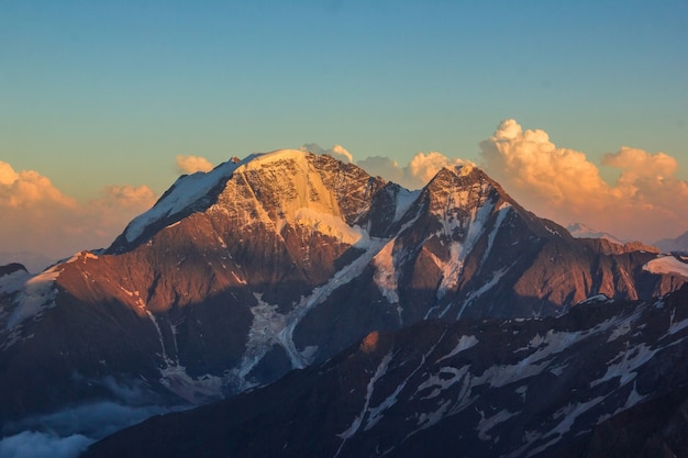 The main Caucasian ridge from mount Elbrus at sunset.