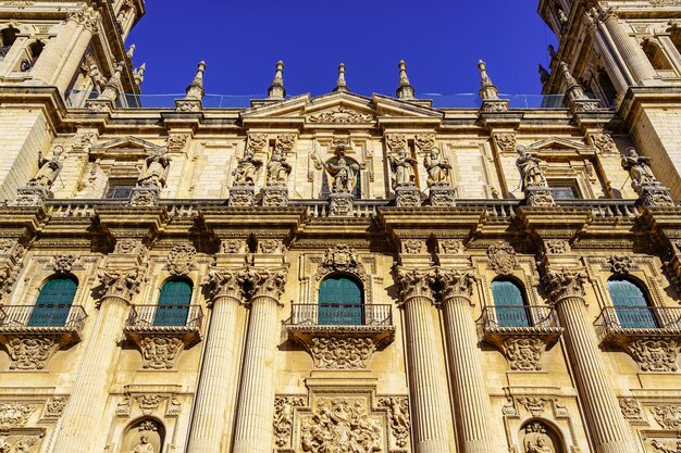 Main facade of the cathedral of Jaen and detail of its typical exterior balconies. Andalusia Spain.