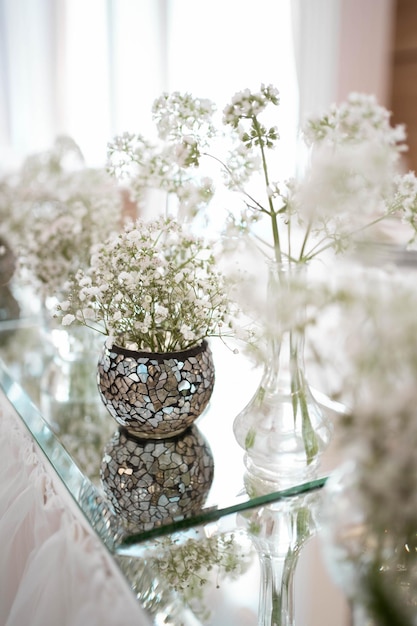 Main table at a wedding reception with beautiful fresh flowers