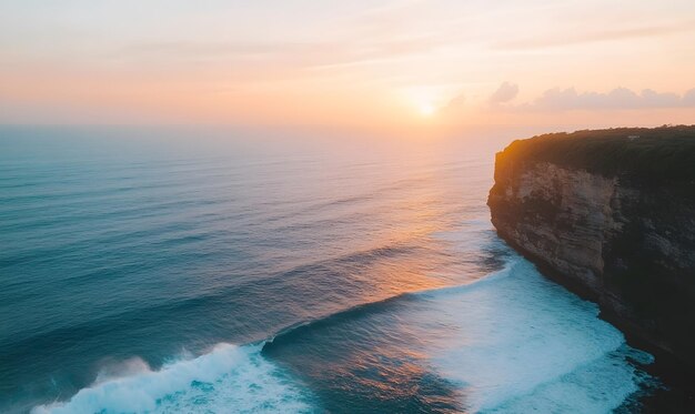 Majestic Coastal Cliff at Golden Hour with Crashing Waves