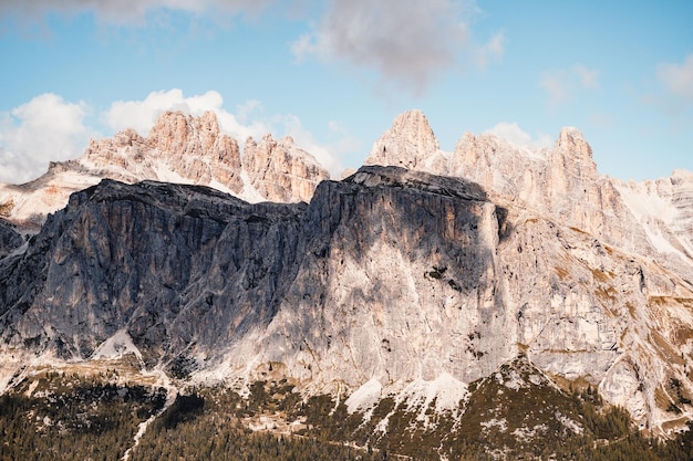 Majestic landscape of Alpine red autumn Cinque Torri Passo Falzarego Tofana Wonderful hiking nature scenery in dolomite italy near Cortina d'Ampezzo