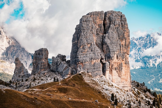 Majestic landscape of Alpine red autumn Cinque Torri Passo Falzarego Tofana Wonderful hiking nature scenery in dolomite italy near Cortina d'Ampezzo