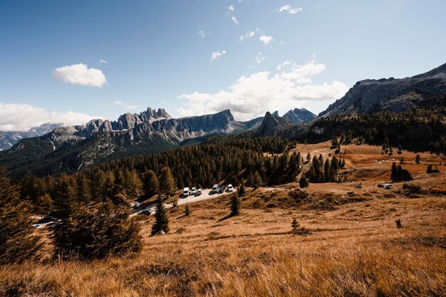 Majestic landscape of Alpine red autumn Cinque Torri Passo Falzarego Tofana Wonderful hiking nature scenery in dolomite italy near Cortina d'Ampezzo