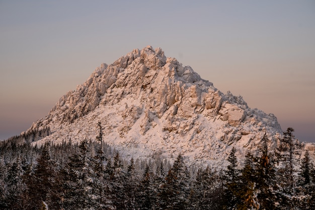 Majestic mountain peak covered in snow in the mountains of the southern Urals