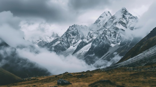 Majestic mountain range dancing with the clouds