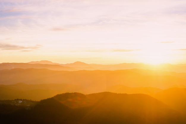 Majestic mountains landscape under morning sky with clouds. Carpathian, Ukraine.