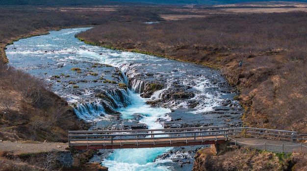 Photo majestic summer aerial view of bruarfoss waterfall the icelands bluest waterfall