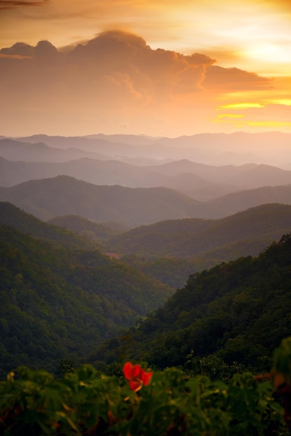 Majestic sunset sky over blue mountains landscape