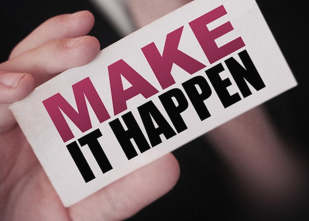 Make It Happen card in businessman hand Business concept