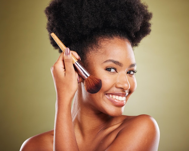 Makeup brush and portrait of black woman with facial product to apply foundation cosmetics or daily skincare routine Cosmetology healthcare and aesthetic face of model happy with beauty treatment