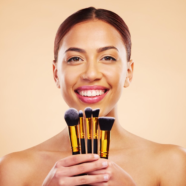 Makeup brush and portrait of woman with cosmetic beauty product for skincare isolated in a studio brown background Eyelid elegant and powder for cosmetology aesthetic glow and soft skin glamour