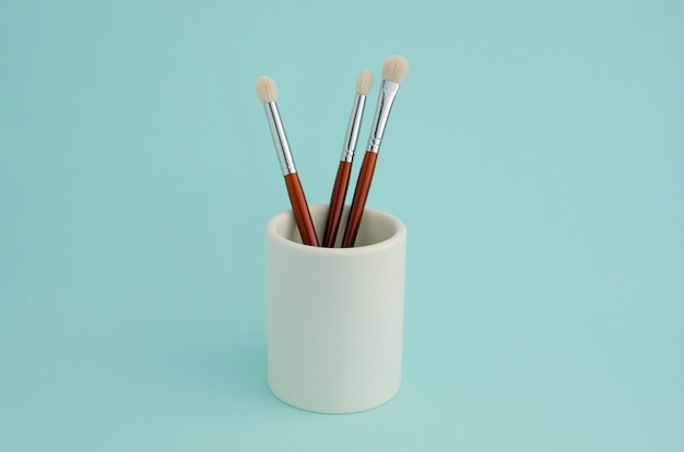 Makeup brushes on a clean background