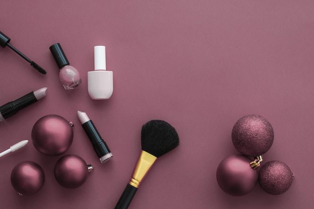 Makeup and cosmetics product set for beauty brand Christmas sale promotion luxury purple flatlay background as holiday design