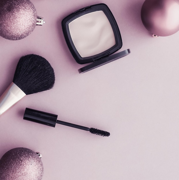 Makeup and cosmetics product set for beauty brand Christmas sale promotion luxury purple flatlay background as holiday design