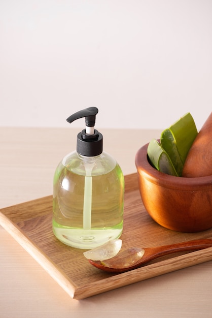 Making aloe vera gel on wood background