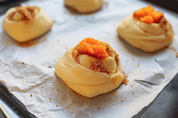 Making butter buns with cinnamon and sugar in craft baking