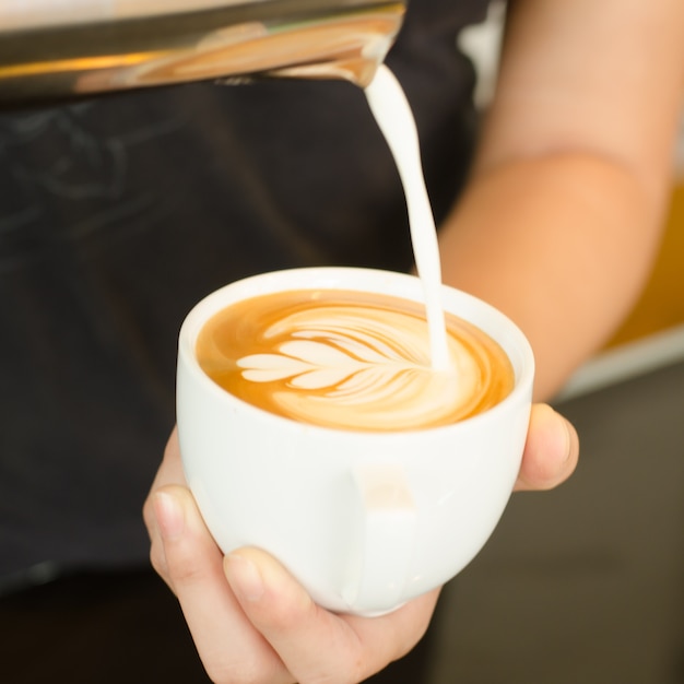 making coffee with latte art