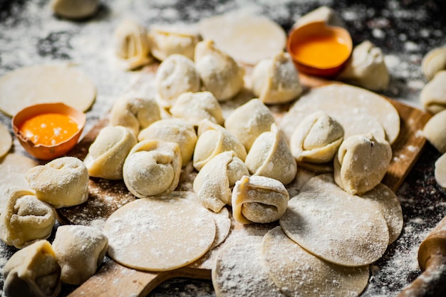 Making homemade dumplings on a cutting board