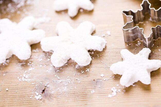 Making marshmallows in shapes of snowflakes for garnish hot chocolate.