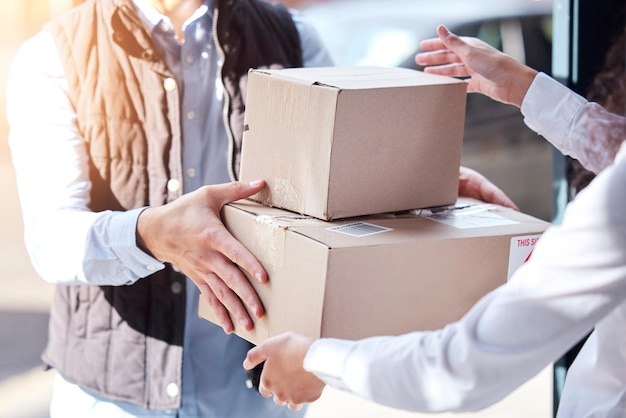 Making a safe and speedy handover Closeup shot of an unrecognisable man making a delivery to a customer