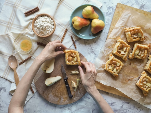 Making sweet rolls dough. Puff pastry pies.