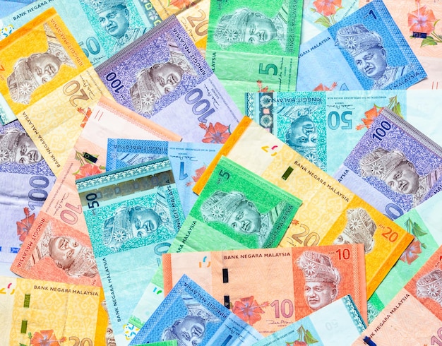 Malaysia currency of Malaysian ringgit banknotes background. Paper money of one, five, ten, twenty, fifty and hundred ringgit notes. Financial concept.