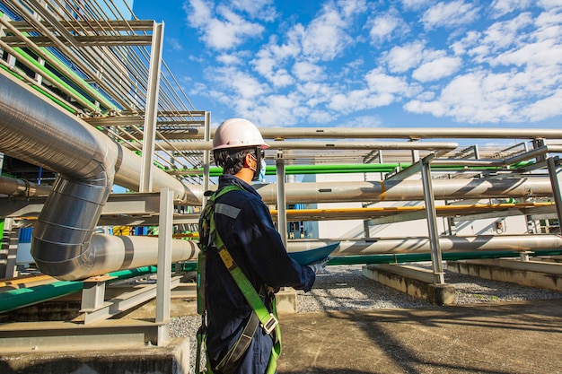 Male to be worker visual inspection inside control room valve tank pipeline power plants