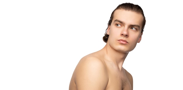 Male beauty Portrait of young man posing shirtless isolated over white studio background