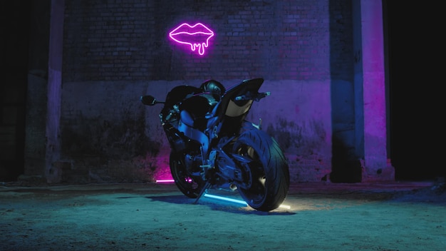 A male biker in a leather jacket sits on a sports bike against a neon pink signboard on a brick wall