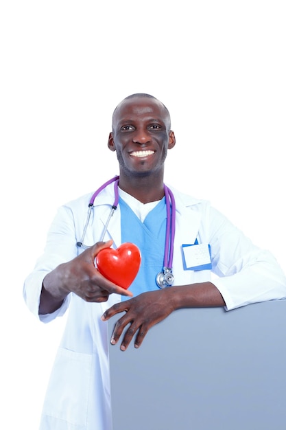 Male doctor with red heart and blank sign isolated on white background Doctor White background