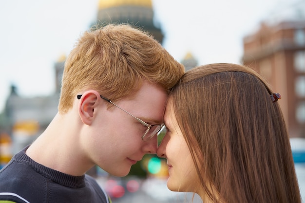 Male and female person looking at each other, young couple full of love