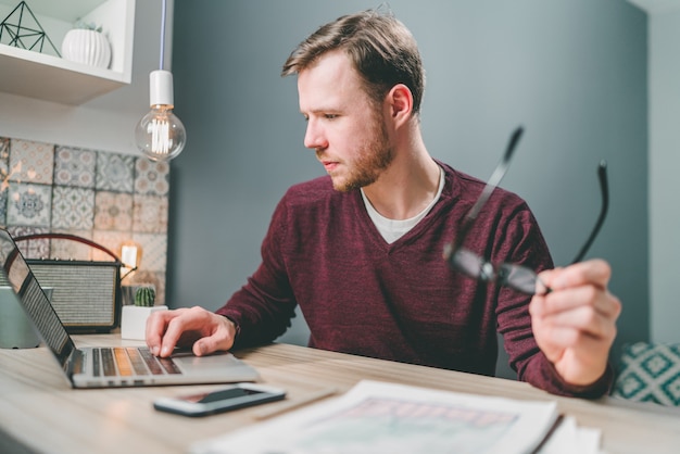 Male financial inspector checking balance