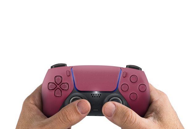 Male hand holding a Next Generation red game controller isolated on white surface.